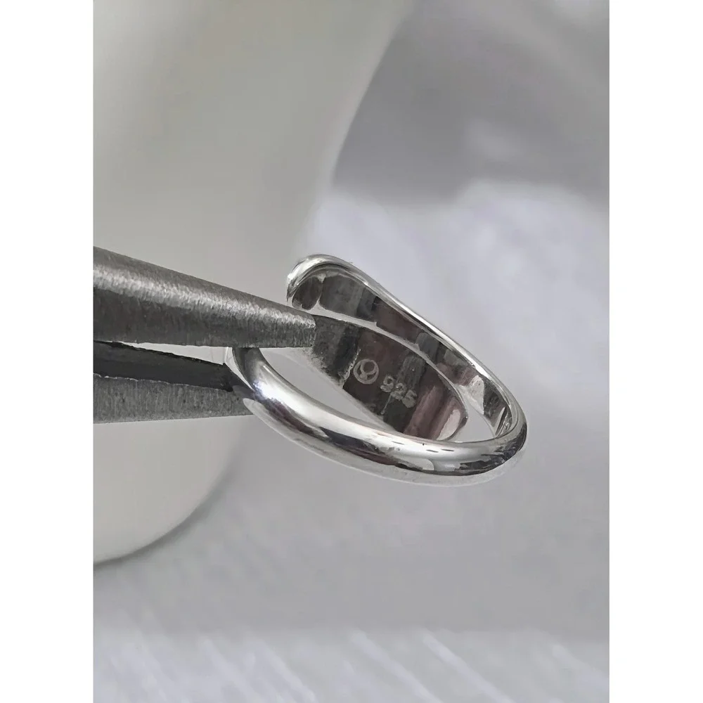 branded but unable to decipher sterling silver